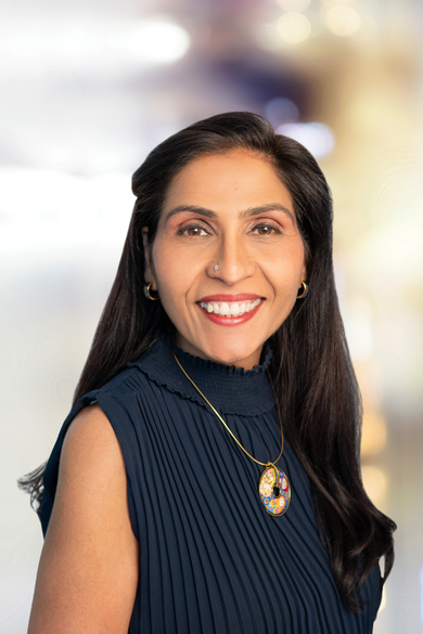 Portrait of Renu Ojha Suresh, REALTOR®.